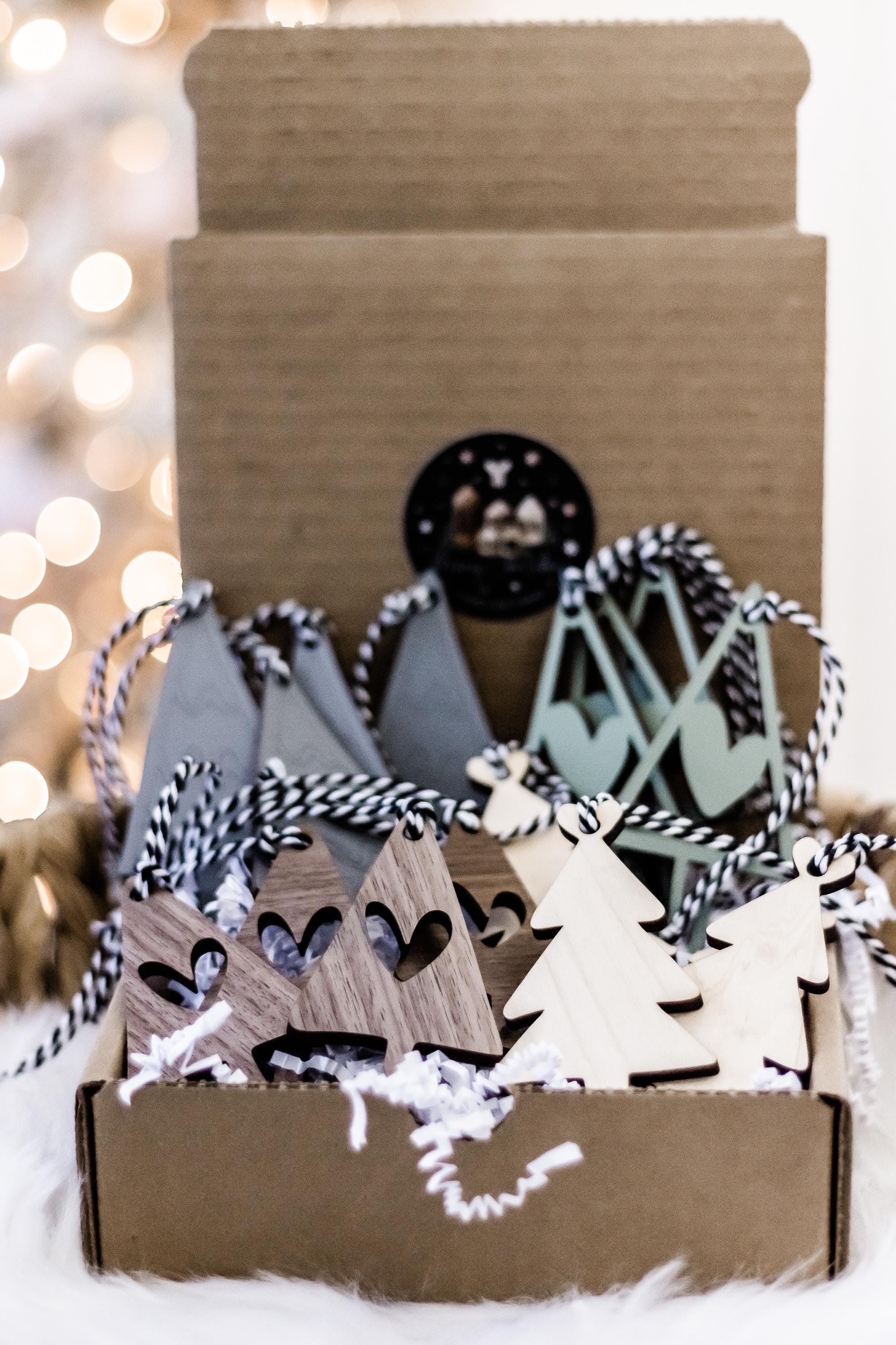 Set of 16 boho wood Christmas ornaments, including striped hang tags and small tree charms