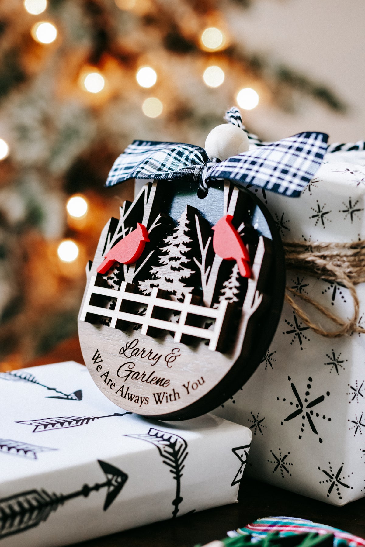 Cardinal memorial keepsake ornament with plaid bow, fence and trees; script message