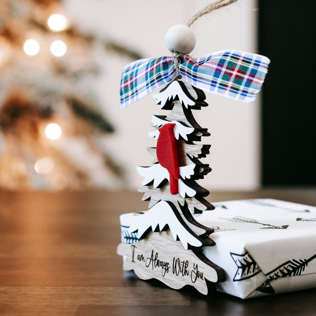 Plaid-bowed cardinal memorial Christmas ornament with layered white tree shapes and red accents