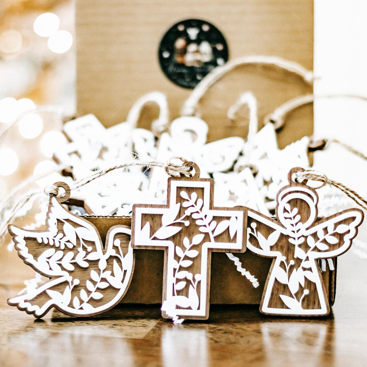 Set of 10 floral cutout Christmas tree ornaments, wooden crosses and angel designs with strings