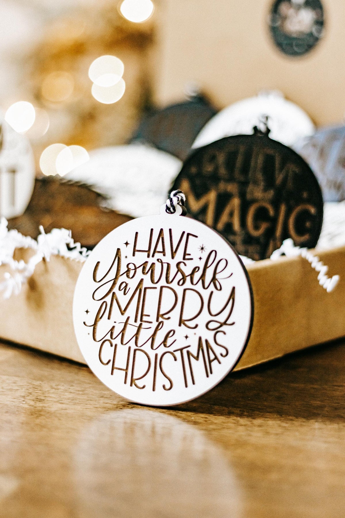 Have yourself a merry little Christmas engraved ornament, white with black and gold text.