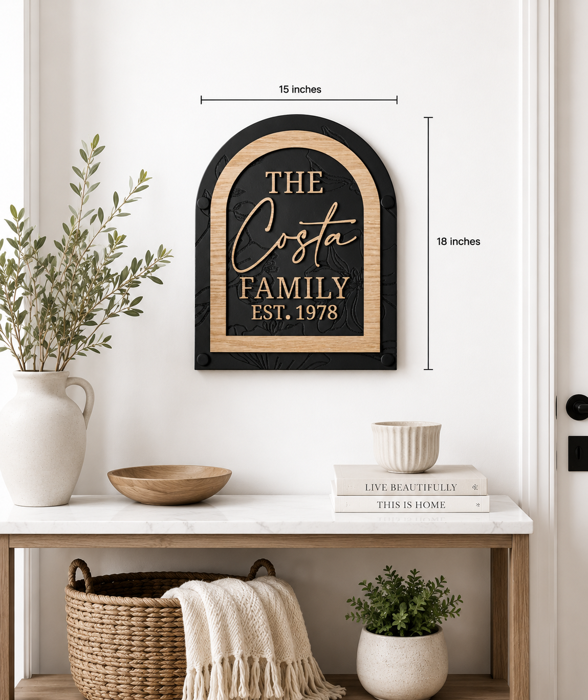 Framed black arch family name sign with gold text “THE Costa FAMILY EST. 1978”.