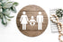 3D restroom changing room sign, round dark wood with white male, female and baby icons