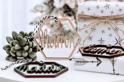 Wooden hex name ornament with cursive “Shamron” engraving, light wood, twine loop
