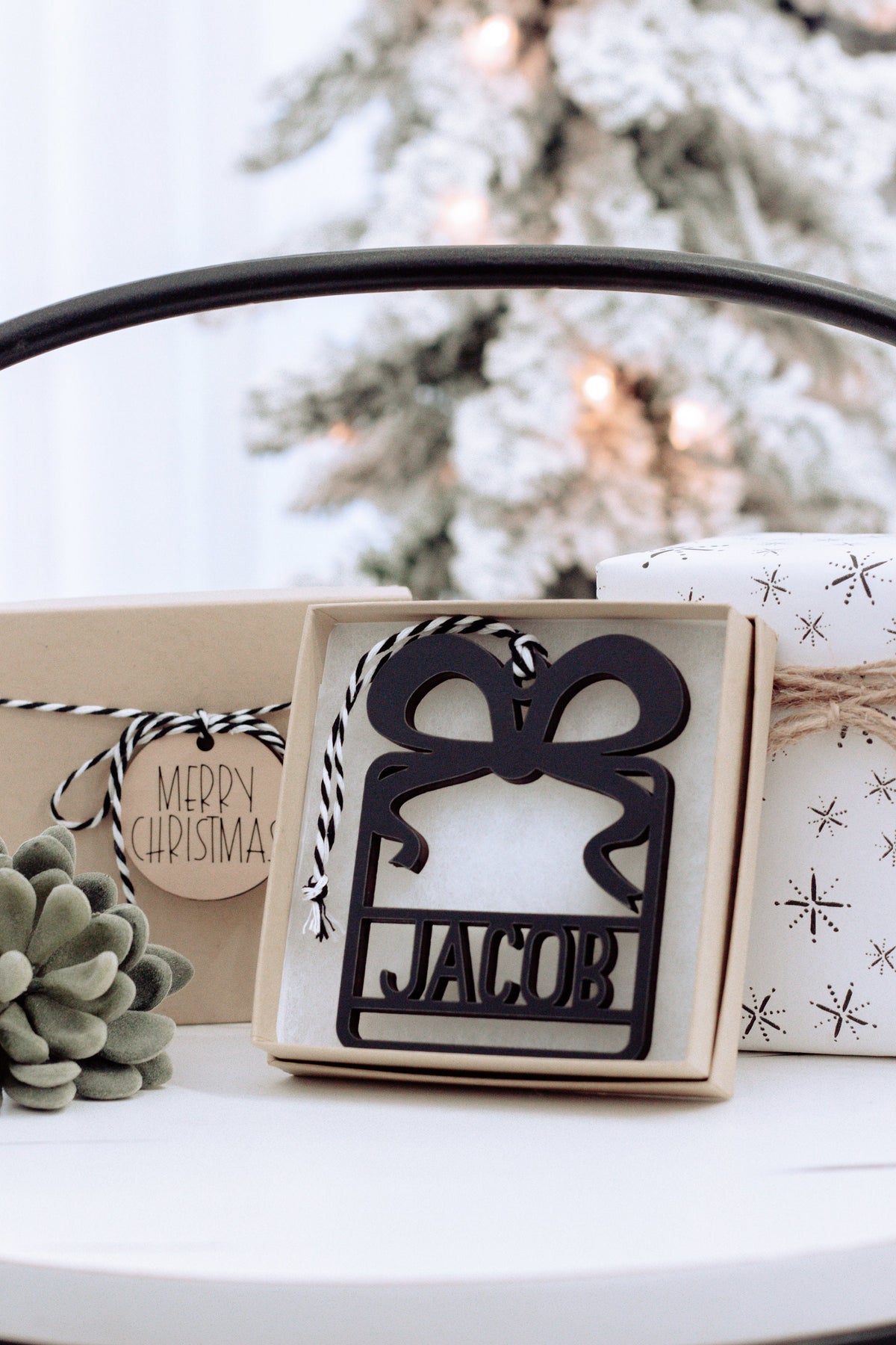 Wooden name ornament in black with &