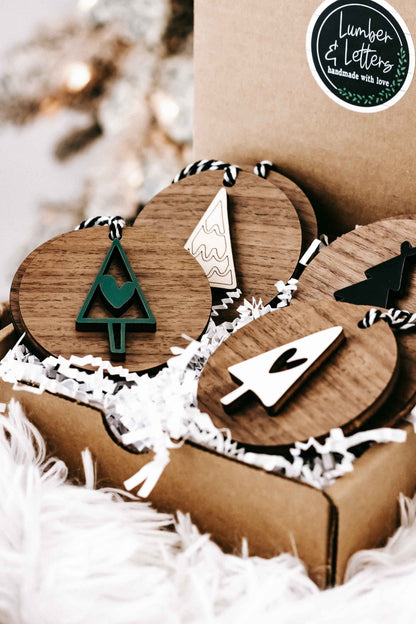 Wooden ornament set in kraft box with tree, heart, and star shapes on striped hangers