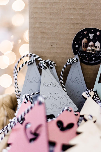 Boho Christmas ornament set with hanging trees in sage, blush pink, and light wood tones