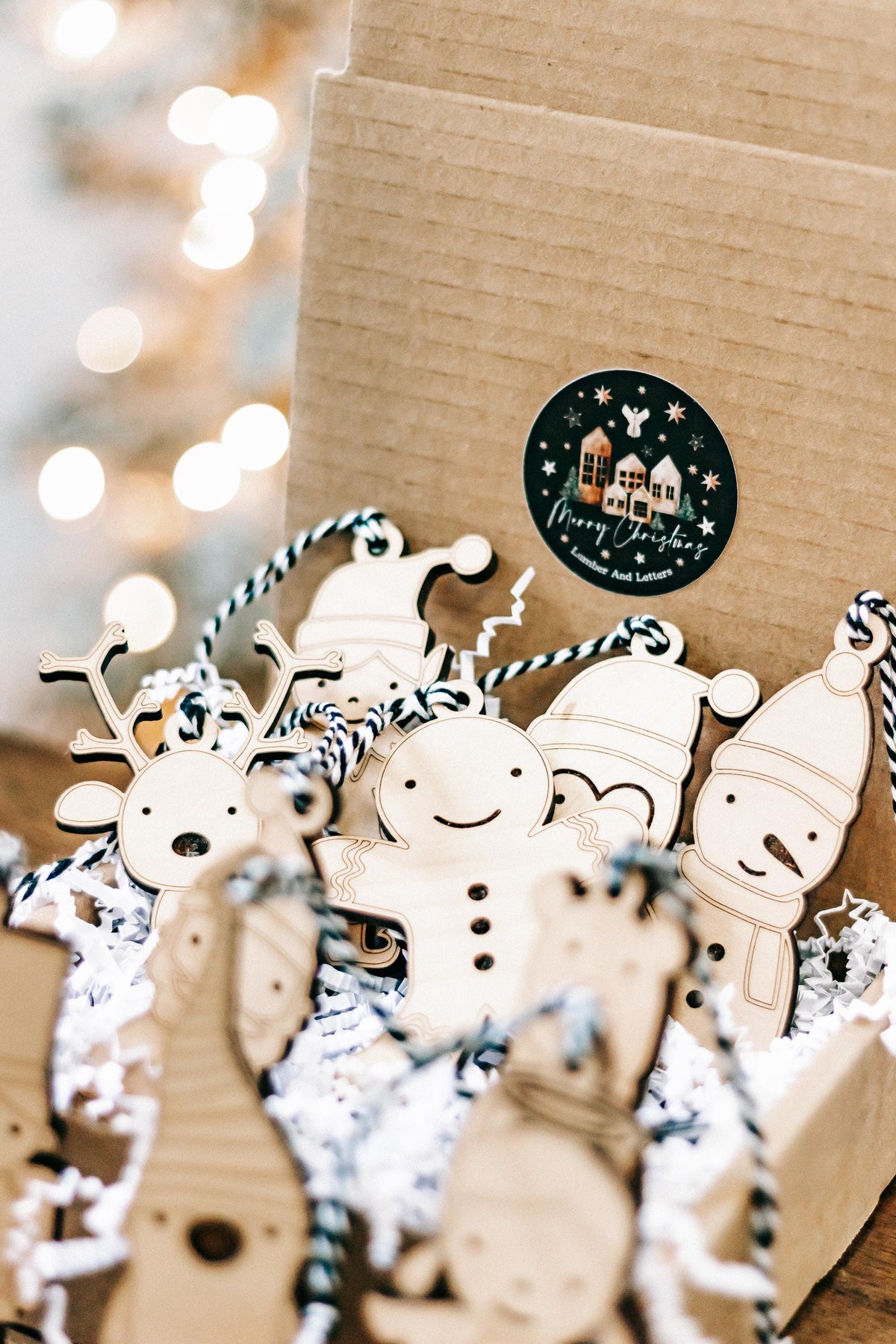 Set of 10 wooden character Christmas tree ornaments with rope hangers, deer and angel figures