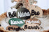 Round wooden name ornaments with rope hangers and teal, black, and tan lettering
