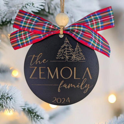 Family name Christmas ornament with red and green plaid bow, “The ZEMOLA family 2024”