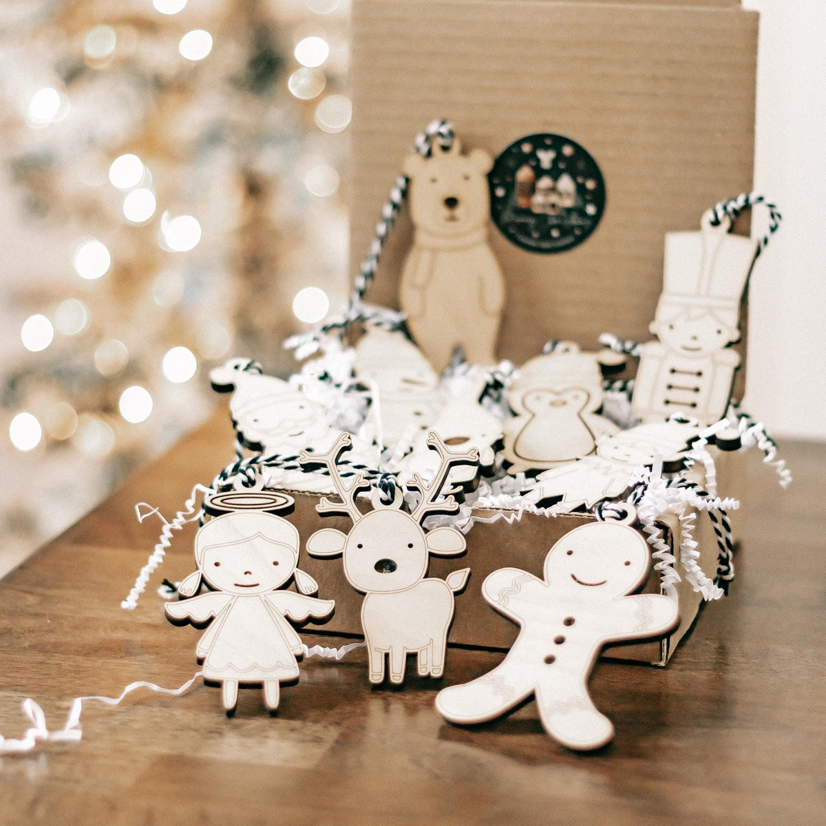 Set of 10 wooden character Christmas ornaments with rope hangers, angel, gingerbread, and reindeer