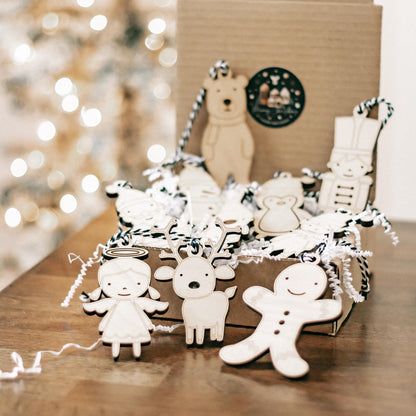 Set of 10 wooden character Christmas ornaments with rope hangers, angel, gingerbread, and reindeer