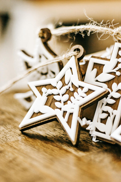 Star-shaped floral cutout Christmas ornament with wooden backing and hanging string, set of 10