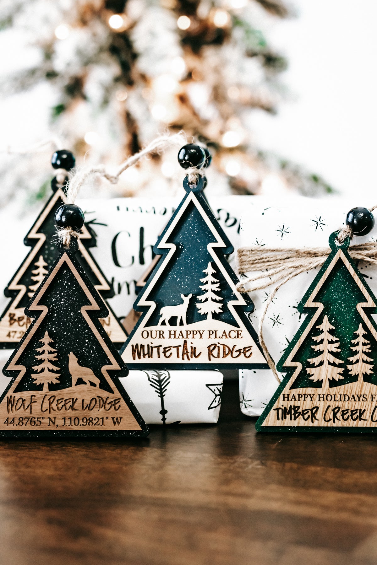 Hanging tree-shaped ornament set with dark, teal, and green color variations