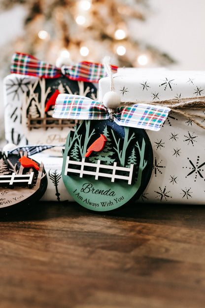 Personalized cardinal memorial ornament with plaid bows, red cardinals, white fence, name text
