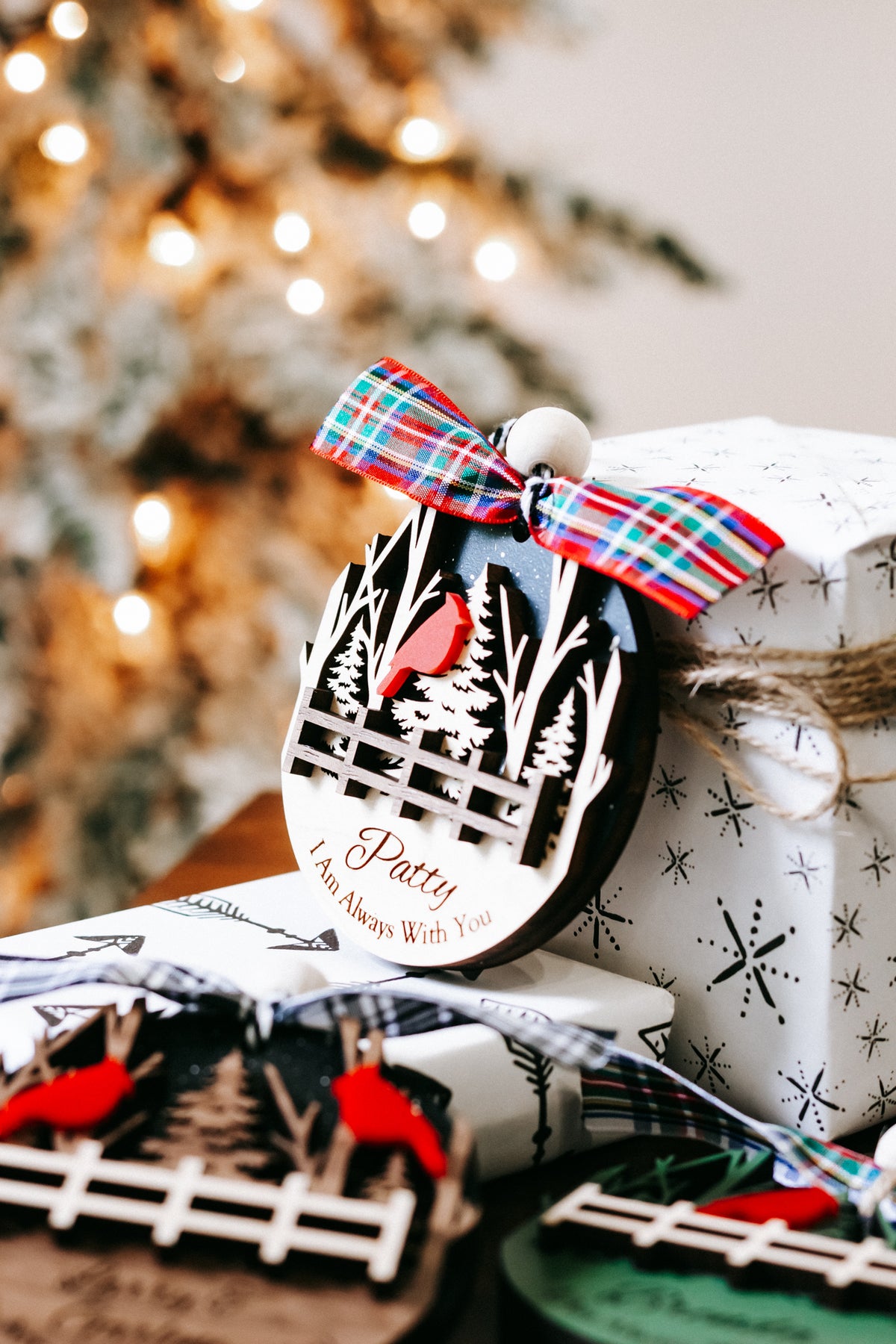 Cardinal memorial keepsake ornament with plaid bow and fence scene; Patty text