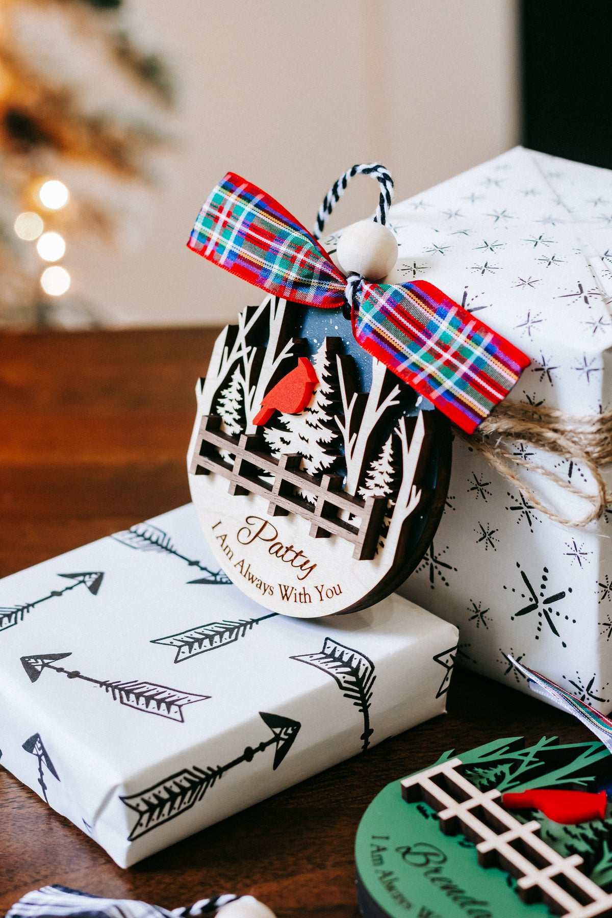 Cardinal memorial keepsake ornament with plaid bow and fence trees; Patty name visible