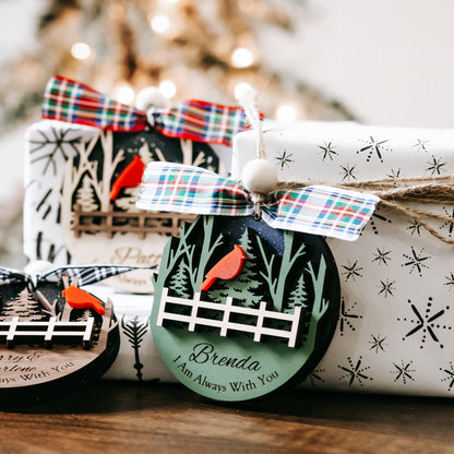 Cardinal memorial keepsake ornament with plaid bow, fence and trees; Brenda text