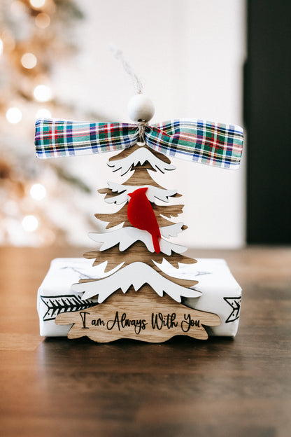 Cardinal memorial Christmas ornament with white tree cutouts, red cardinals, plaid bow