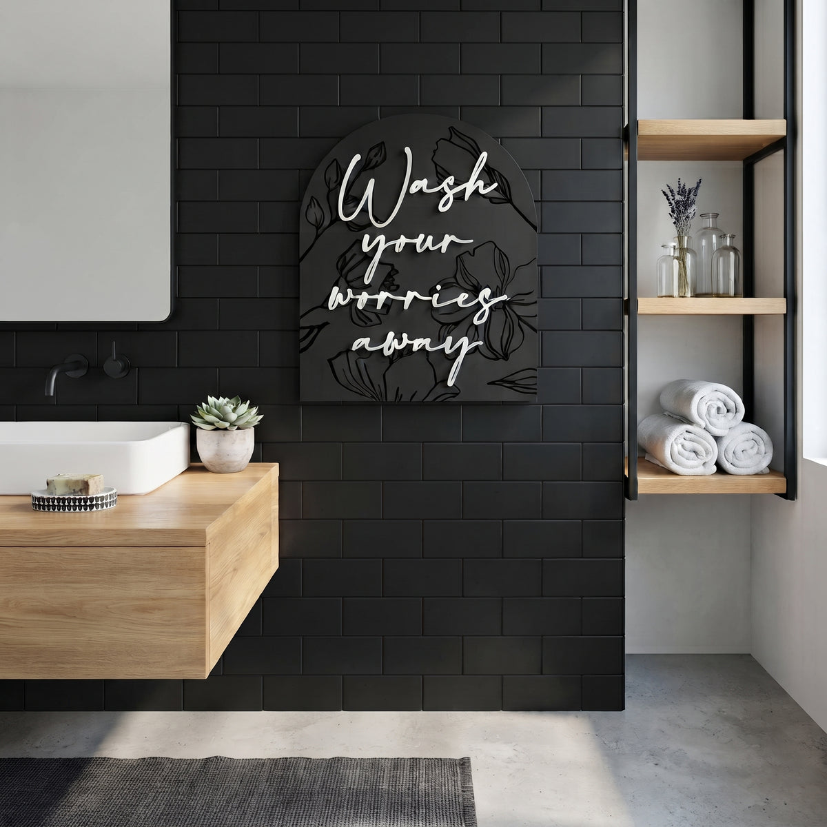 Arched black wall sign with cursive &