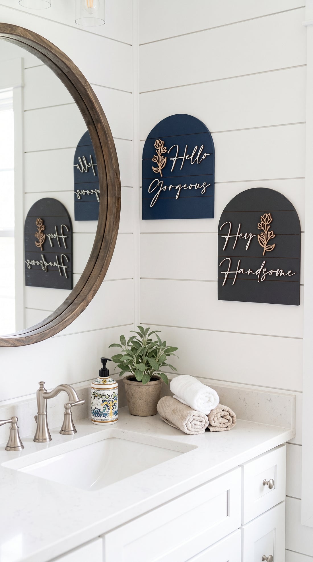 Arched wall art panels in navy and dark with gold leaf accents and cursive sayings: Hello, Gorgeous, Hey