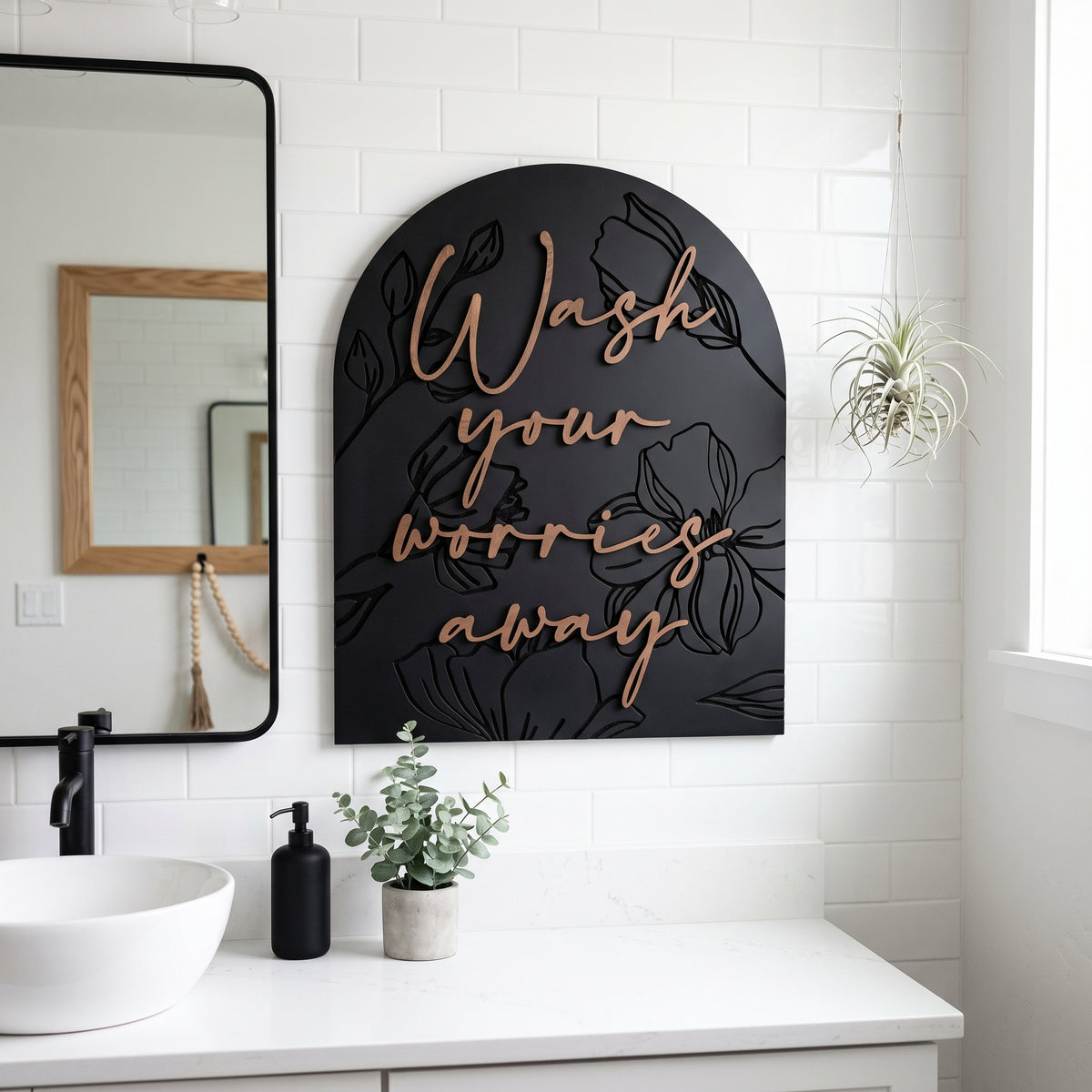 Arched black wall sign with gold &