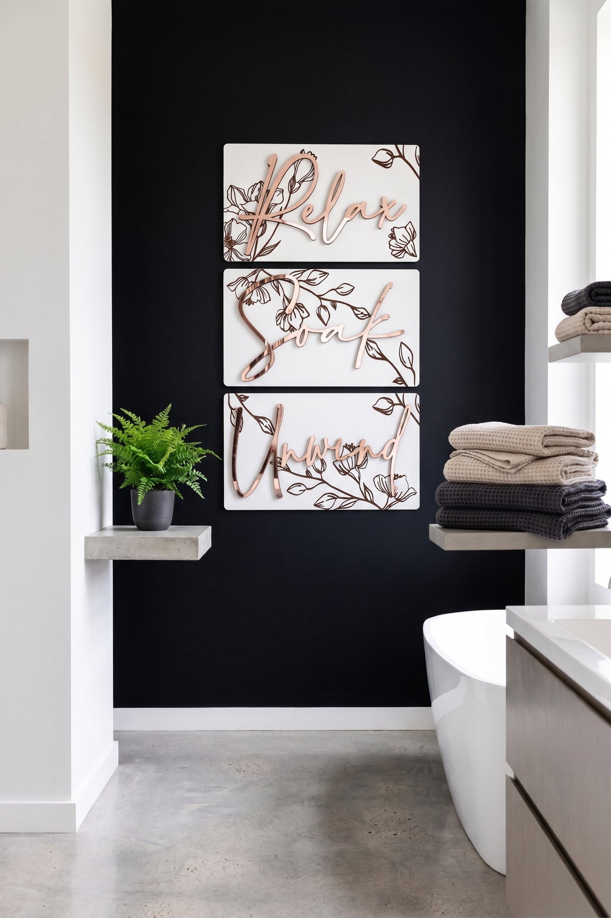 White floral wall art set, three stacked framed rectangles with gold floral script lettering