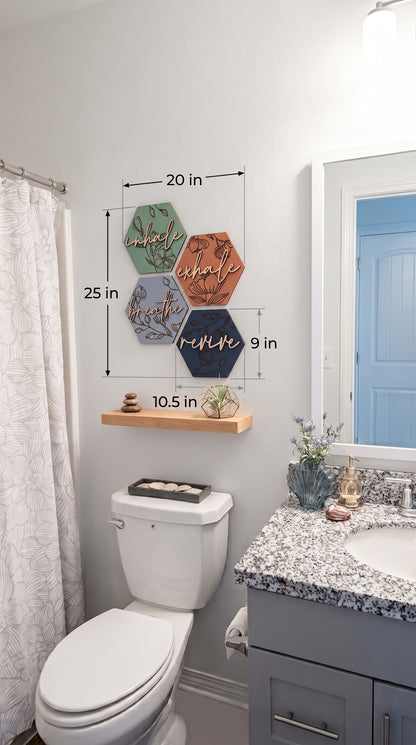 Hexagon wooden wall art set with engraved floral and script, shown on a small wall shelf