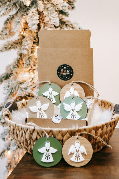 Set of round angel ornaments in green and white, wood and painted styles, hanging on twine