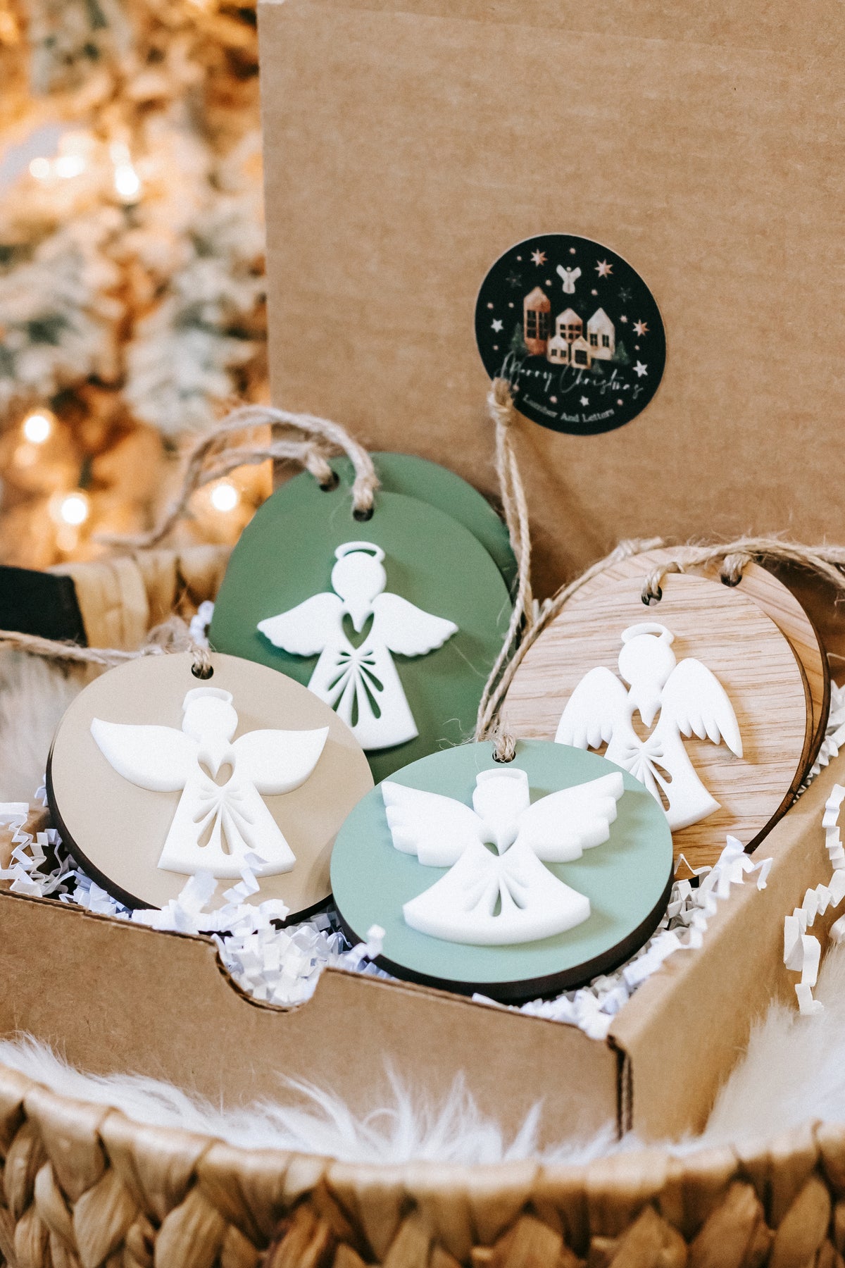 Set of round layered angel ornaments with hanging cords, green and white discs