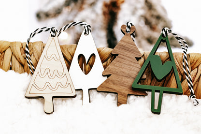 Assorted wooden Christmas ornaments: tree, heart, and triangle shapes with rope hangers