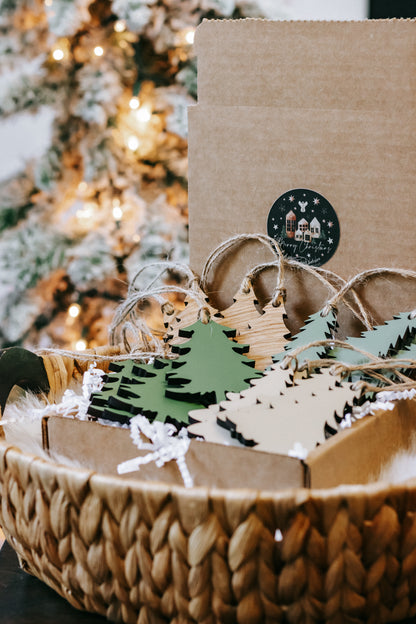 Wooden Christmas tree ornaments in green and natural wood with twine hangers