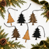 Spruce tree Christmas ornaments with black, tan, and brown finishes on string hangers.