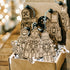 Set of 6 engraved wooden nutcracker ornaments in a gift box with dark bead hangers