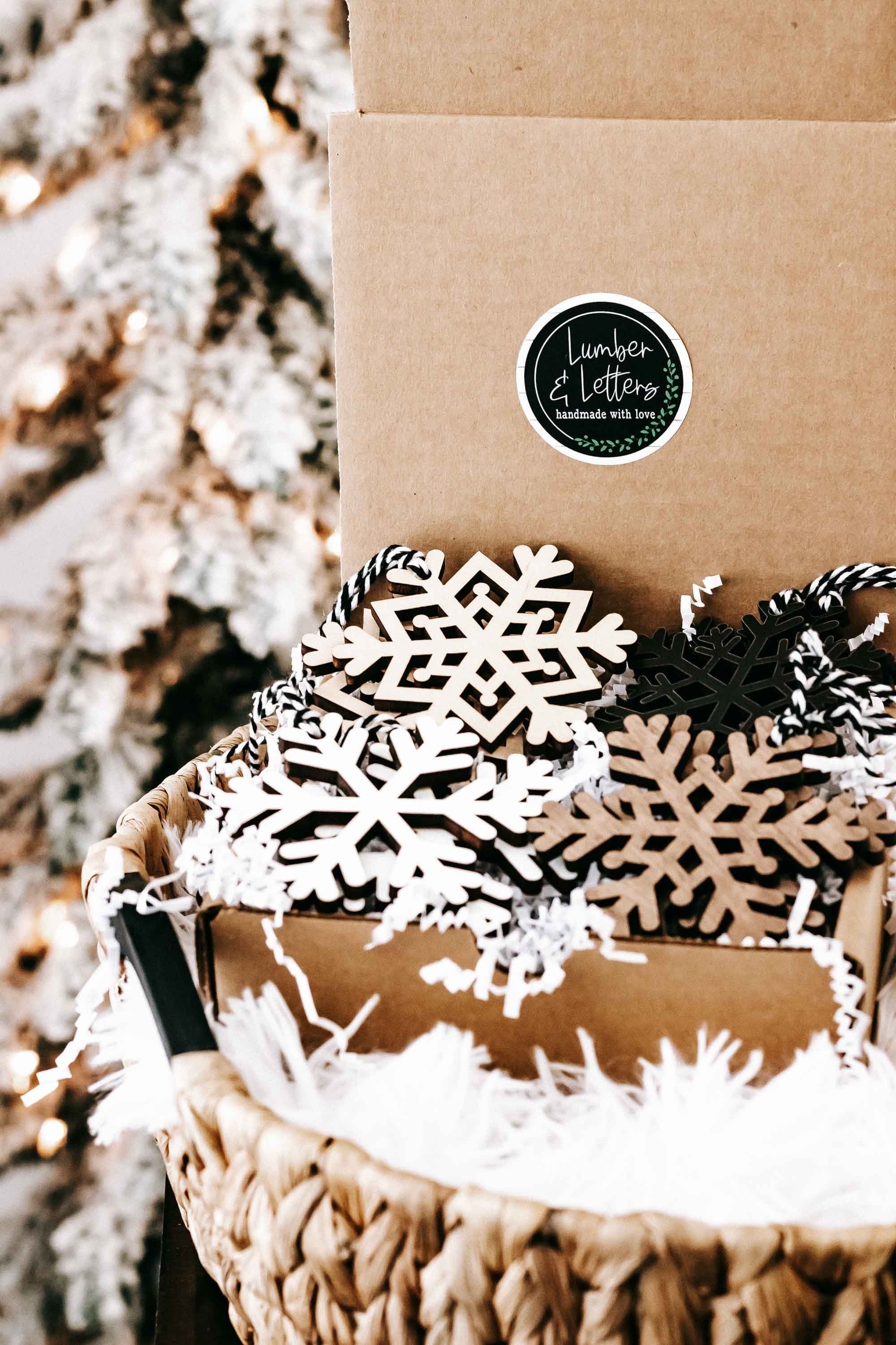 Wood snowflake ornament set in a gift box: mixed white and dark cutout snowflakes