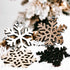 Wood snowflake ornament set: white, dark, and tan cutout snowflakes with hanging loops