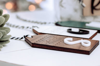 Personalized wooden stocking tag with white letter 8 and Nordic etched pattern