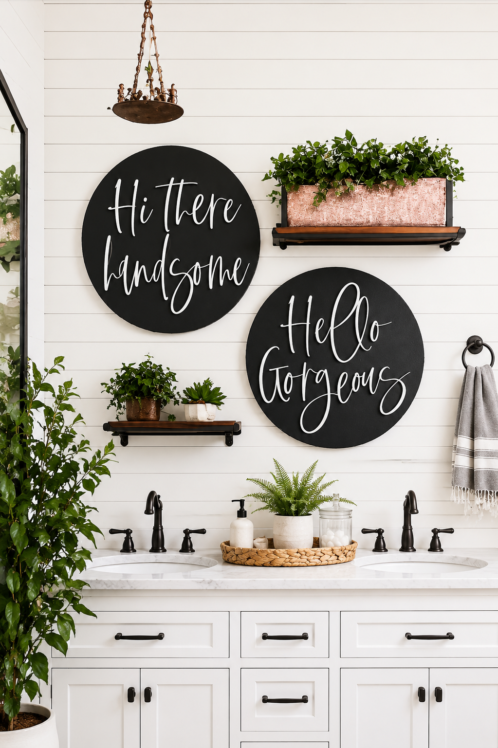 Two round black wall signs with white cursive: “Hi there handsome” and “Hello gorgeous” above sink.