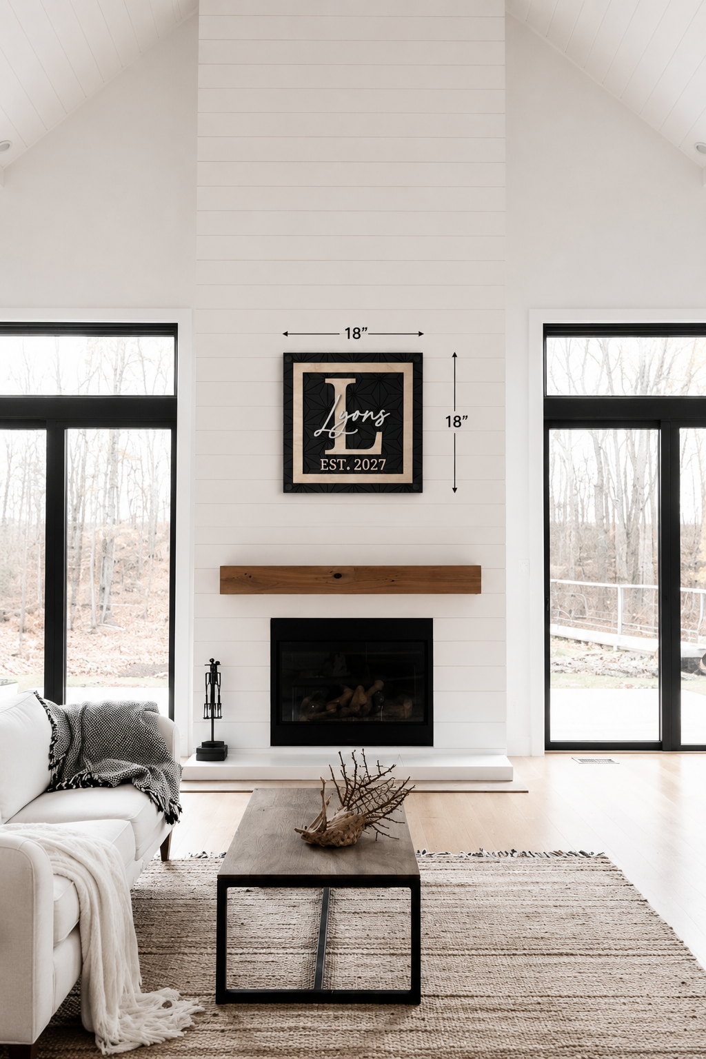 Framed monogram family name sign, black background, gold script and EST. 2027; 18 in.