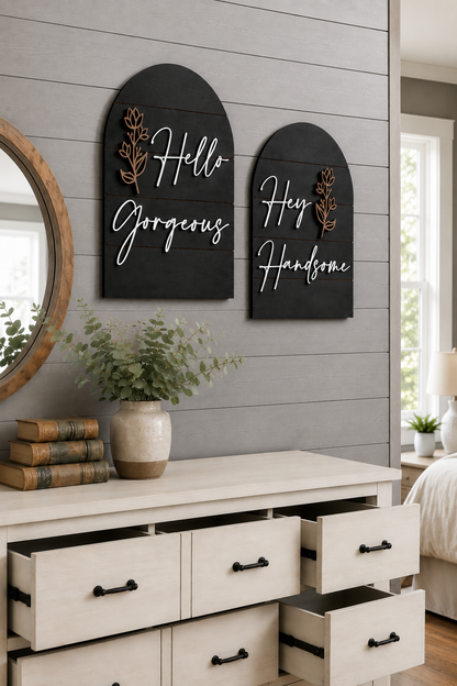 Black arched wall art set with gold leaf accents and cursive text: Hello, Gorgeous, Hey, Handsome