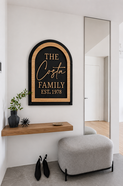 Framed arch family name sign with gold script The Costa and Est. 1978 on black panel