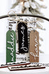 Hanging modern stocking tags in green, black, and brown with white script