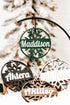 Personalized snowflake ornaments set with engraved names and dark metal hanger, gift-ready
